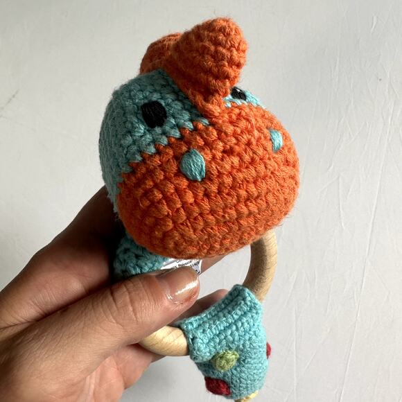 Pebble Hand Knit Turquoise Dinosaur Wooden Teething Ring w/ Rattle - Picture 7 of 10